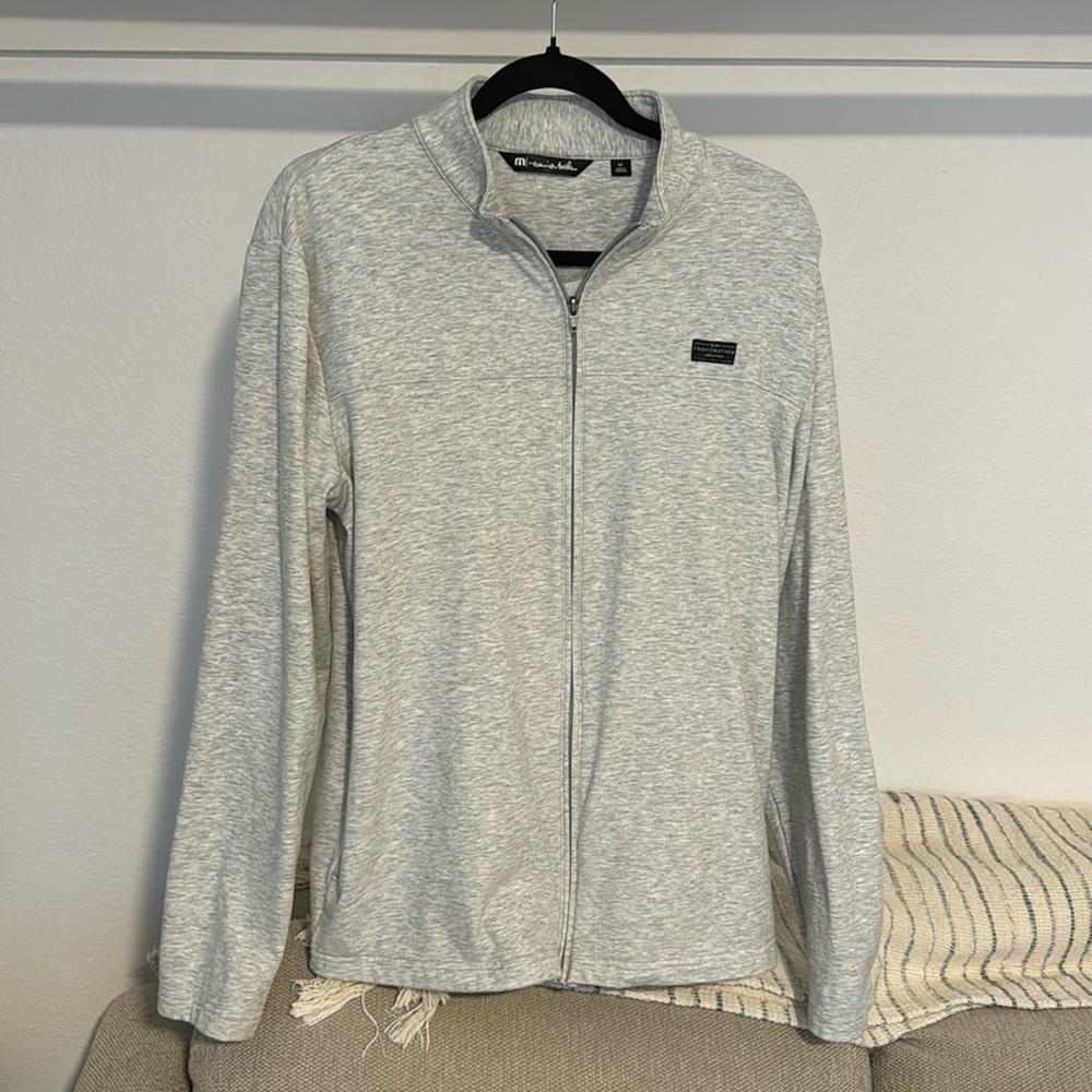 Travis Mathew tip up